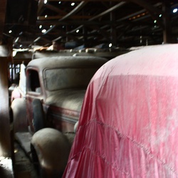 Tobbacco barn full of cars