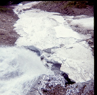 Waterfall below weeping wall on Sun Road Glacier June 6 1970